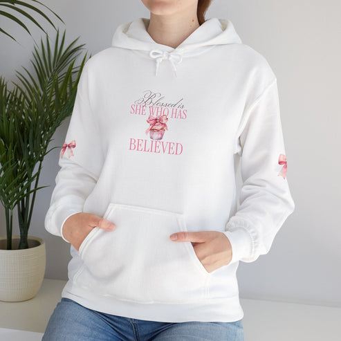  White hoodie with cute pink cupcake with bow and bows on sleeves, says "blessed is she who has believed"