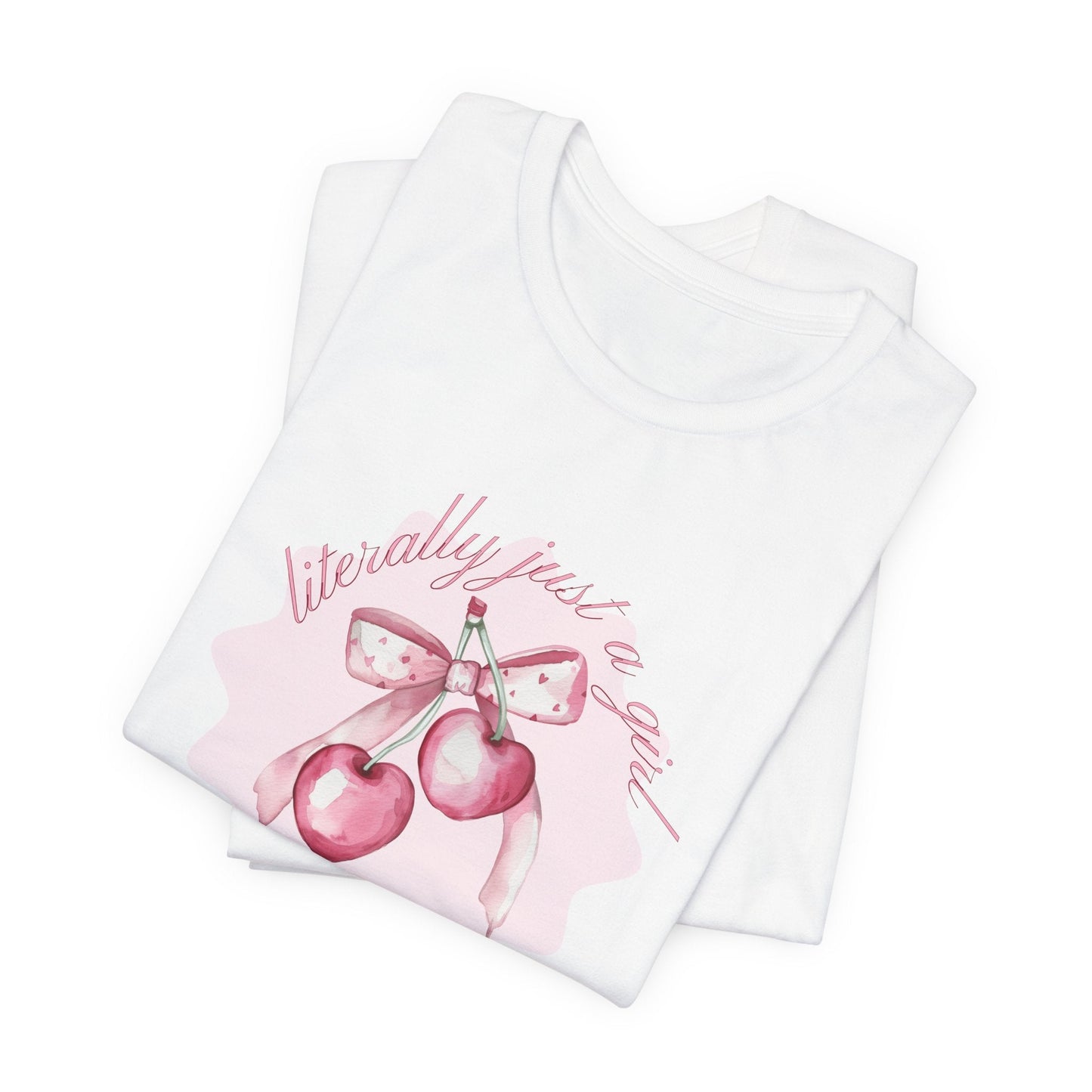 hope + joy collective white short sleeve t-shirt folded with image of pink cherries with pink bow that says "literally just a girl, super sweet, super chic"