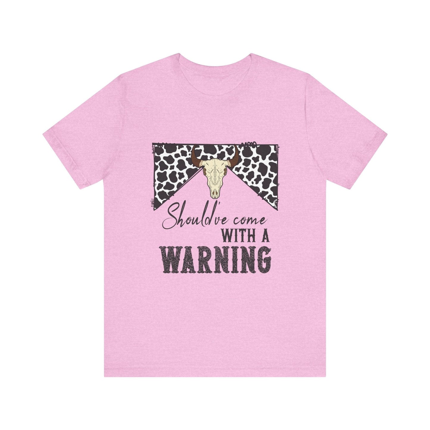 hope + joy collective bubble gum pink short sleeve t-shirt with a graphic image of a leopard banner and cow skull in the middle that says "Should've Come with a Warning" in western font
