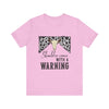 hope + joy collective bubble gum pink short sleeve t-shirt with a graphic image of a leopard banner and cow skull in the middle that says "Should've Come with a Warning" in western font