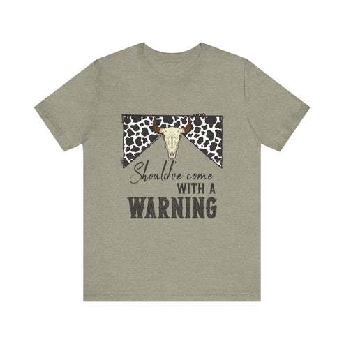 hope + joy collective heather stone short sleeve t-shirt with a graphic image of a leopard banner and cow skull in the middle that says "Should've Come with a Warning" in western font