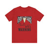 hope + joy collective red short sleeve t-shirt with a graphic image of a leopard banner and cow skull in the middle that says "Should've Come with a Warning" in western font