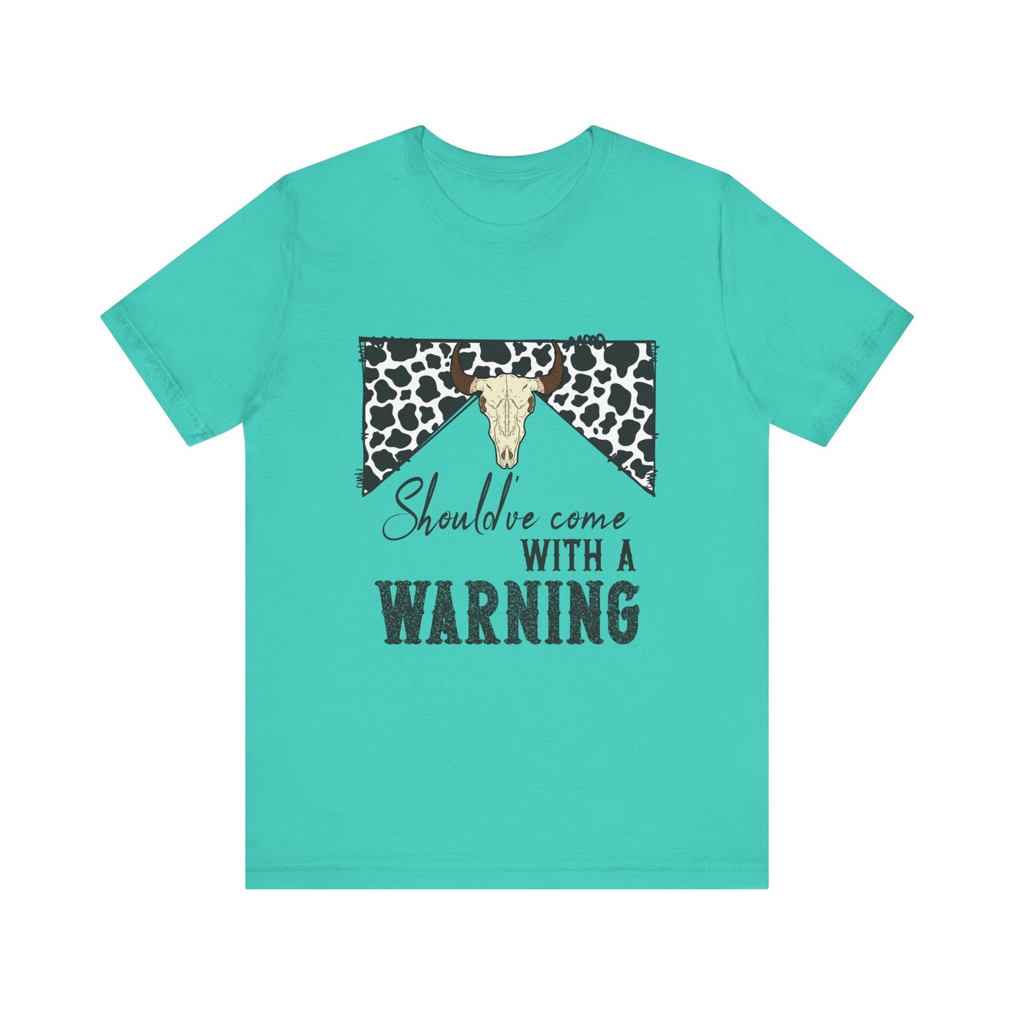 hope + joy collective teal short sleeve t-shirt with a graphic image of a leopard banner and cow skull in the middle that says "Should've Come with a Warning" in western font