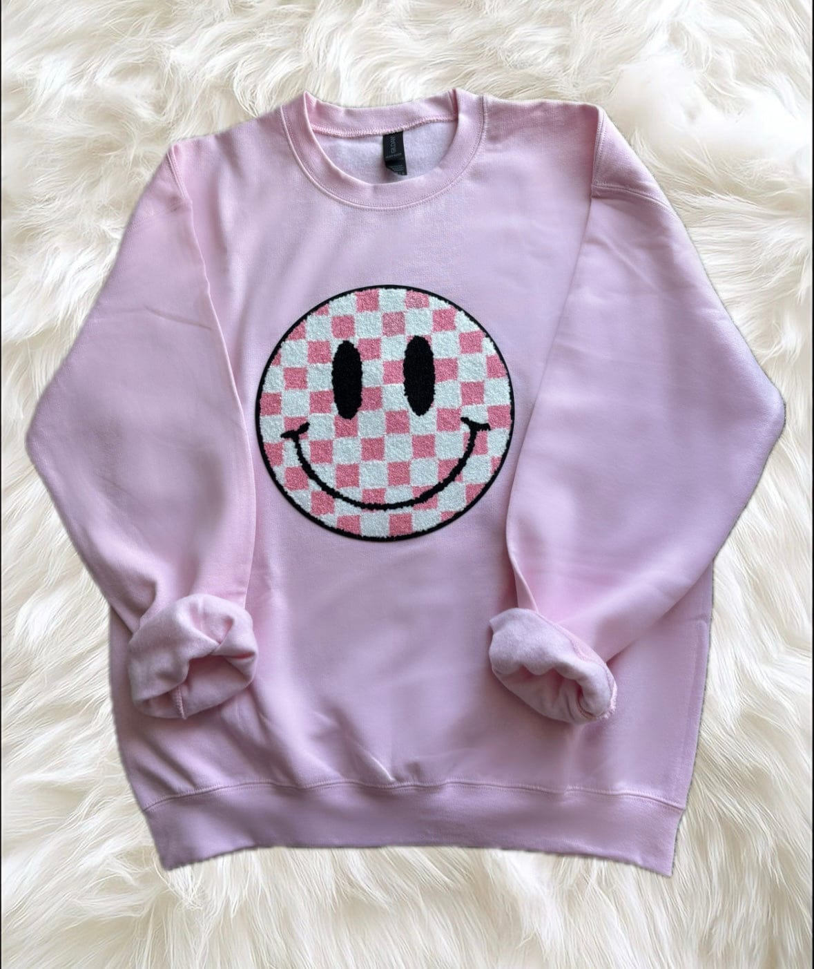 hope + joy collective Pink Smile Crewneck Sweatshirt - light pink crewneck sweatshirt with large pink and white checkered smiley face patch